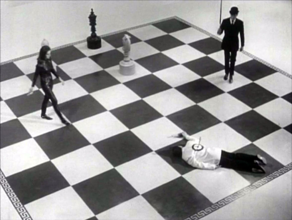 You know. A great big chess board with black and cats enacting the game.